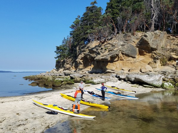 Sea kayaks on beach on Chuckanut Island.