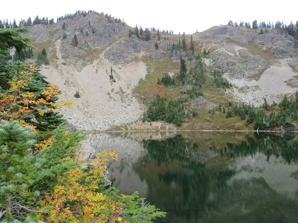 An alpine lake beneath a peak.