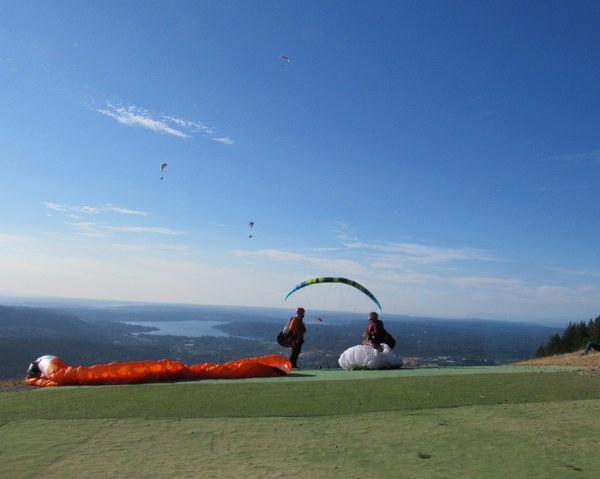 Paragliders preparing to take off.