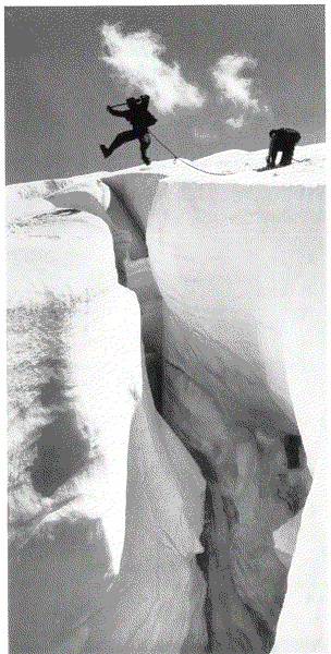 Fred Beckey Jumps Crevasse with Ira Spring