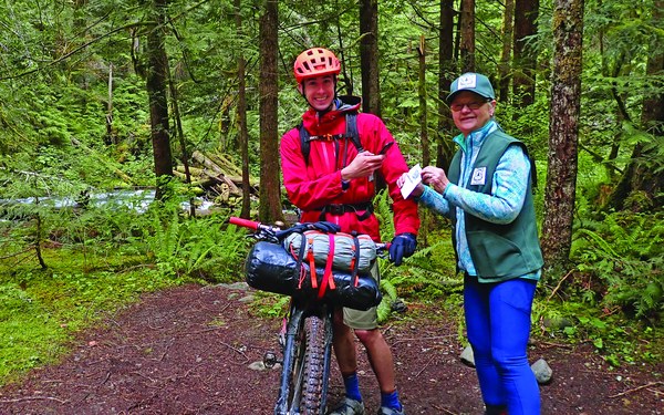 cc_2022-06-14_11 Giving Trail Survey code to a trail biker (1).jpg