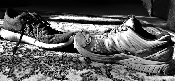 On the left you have a semi-minimalist road running shoe versus a heavier duty trail running shoe. Take note of a few of the differences between the two.