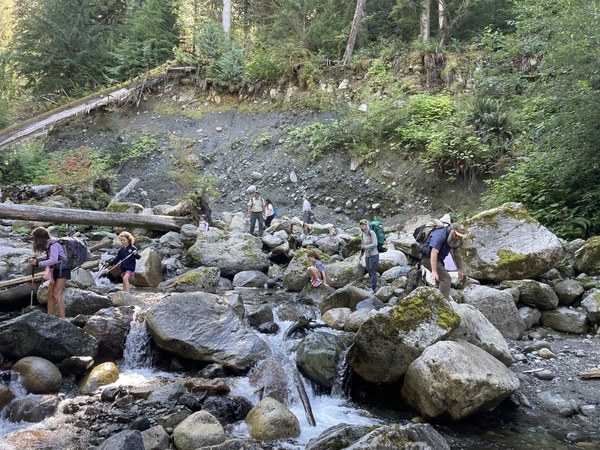 Rep._Larsen_Hike_scrambling shot. Photo by WTA Staff.jpg