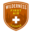 This badge represents successful completion of the Wilderness First Aid Course.
