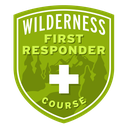 This badge represents successful completion of our Wilderness First Responder Course, a week-long, in-depth course in wilderness medicine aimed at guides and wilderness educators.